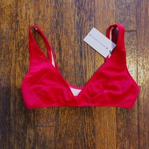 Solid and stripped red swimsuit top